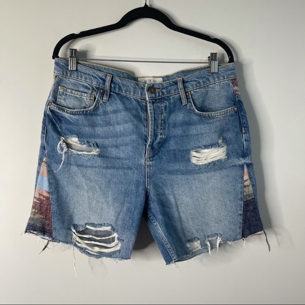 - Free People distressed cut off button fly shorts